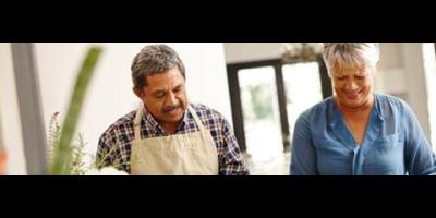 Healthy banner, two people cooking in a kitchen